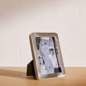 Elegant tabletop metal photo frame created for showcasing memorable pictures on desks nightstands or decorative display corners