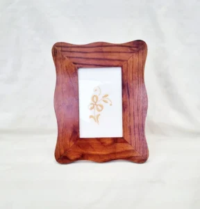 Wooden photo frame handcrafted design for home wall decor with natural finish and timeless artistic appeal